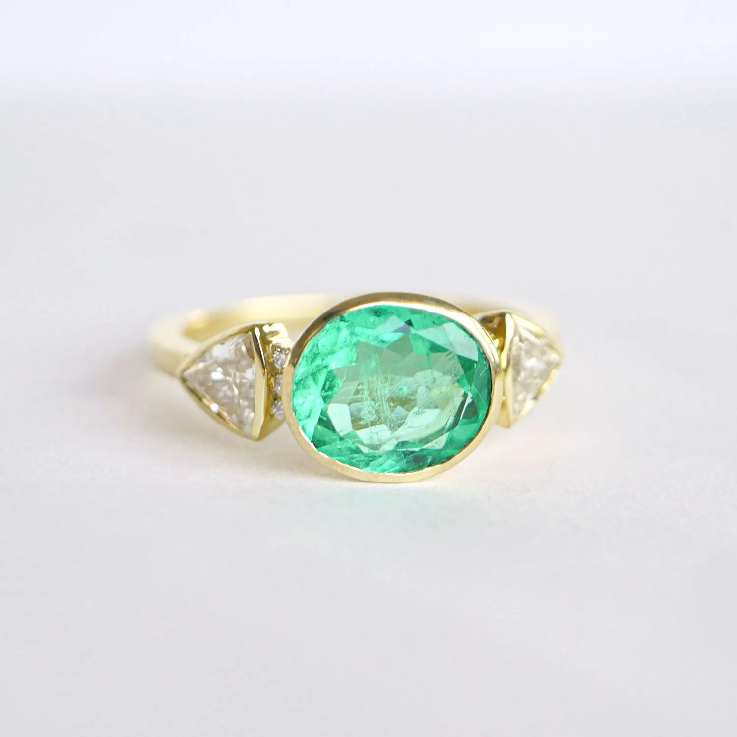 2.43 Carat Oval Colombian Emerald & Trillion Diamond Ring