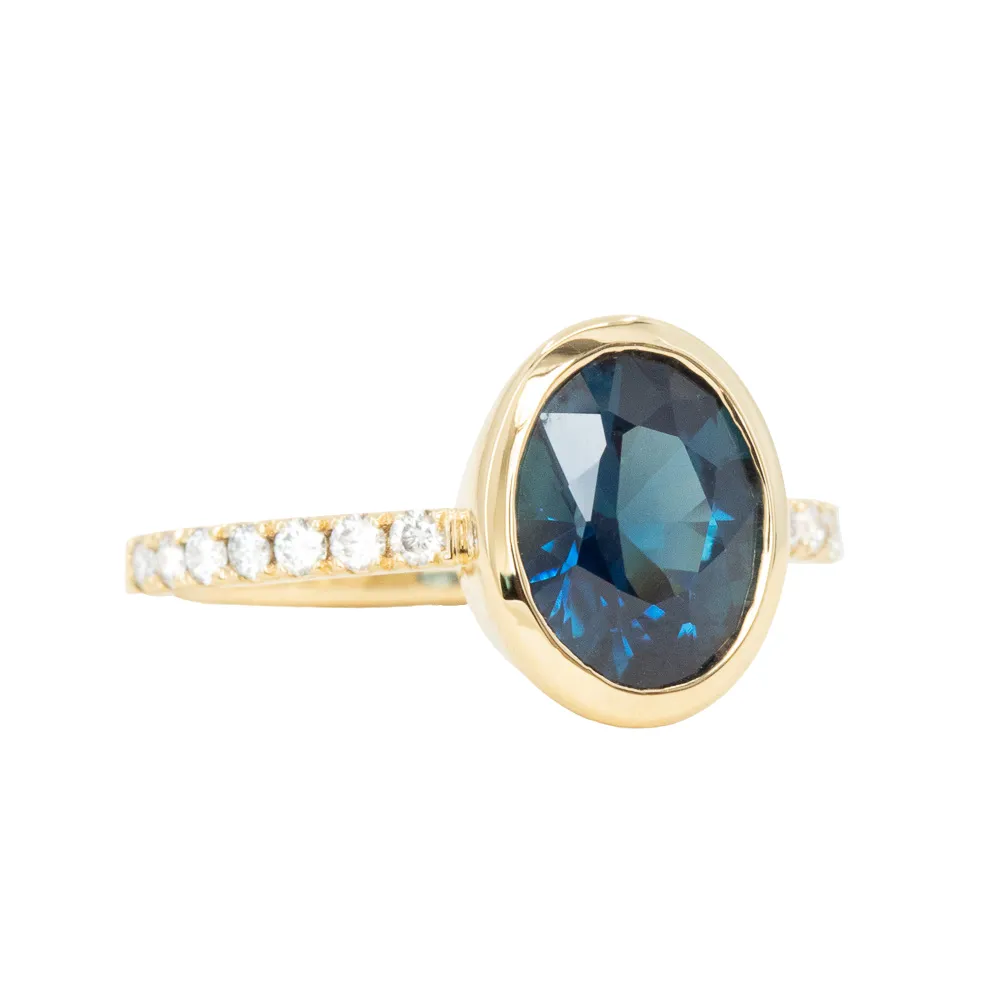 2.49ct Oval Blue Nigerian Sapphire Low Profile Bezel with French Set Diamonds 18k Yellow