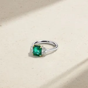 Nouveau Two Tone Three Stone Emerald and Diamond Ring