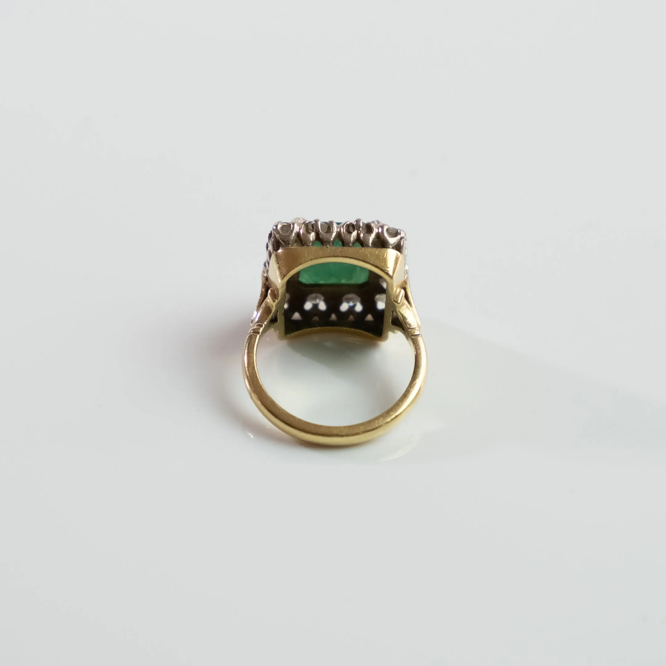 S O L D 1930, LONDON WHITE AND YELLOW GOLD EMERALD AND DIAMOND CLUSTER RING