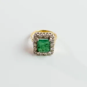 S O L D 1930, LONDON WHITE AND YELLOW GOLD EMERALD AND DIAMOND CLUSTER RING